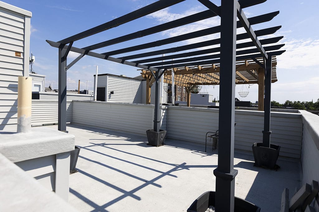 Rooftop deck with pergola built over a flat roof
