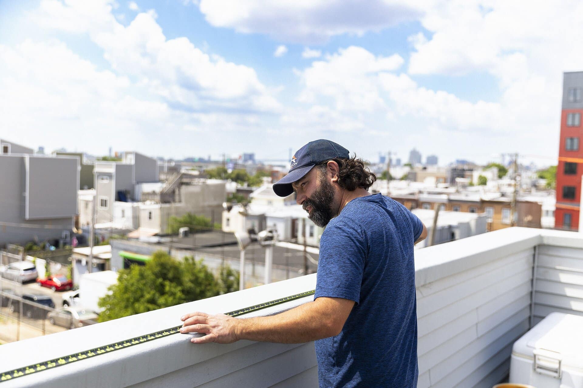 Garrison Roofing crew working above the Philadelphia skyline