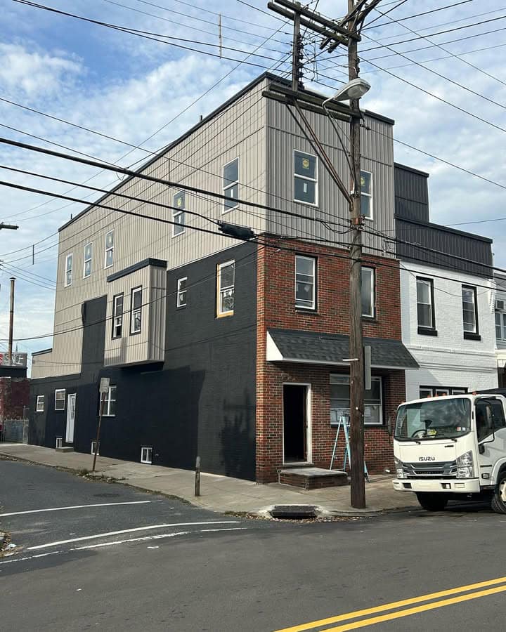 After — Third-story addition + full exterior