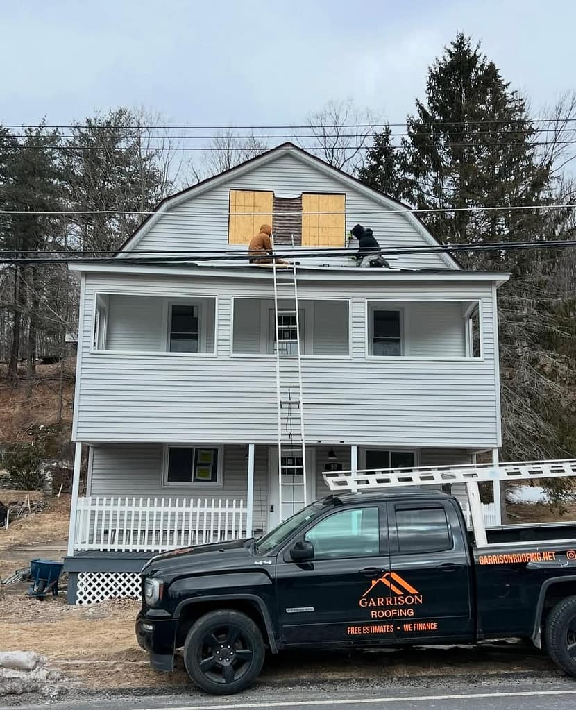 Shingle roof repair in progress