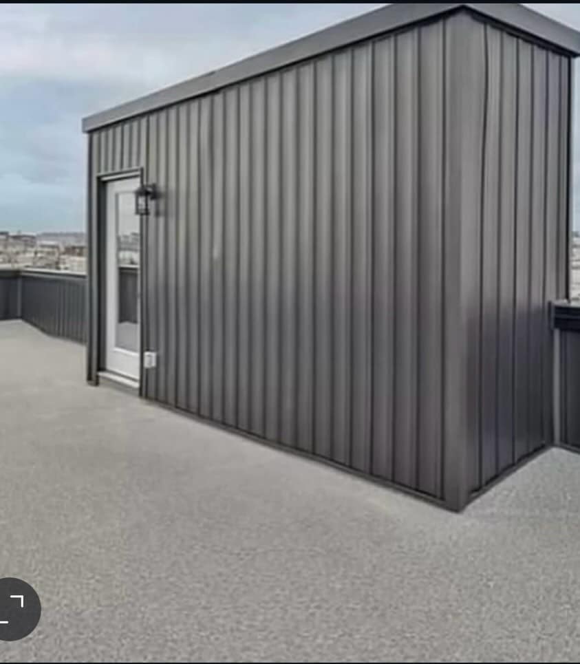 Custom rooftop deck built by Garrison Roofing in Philadelphia