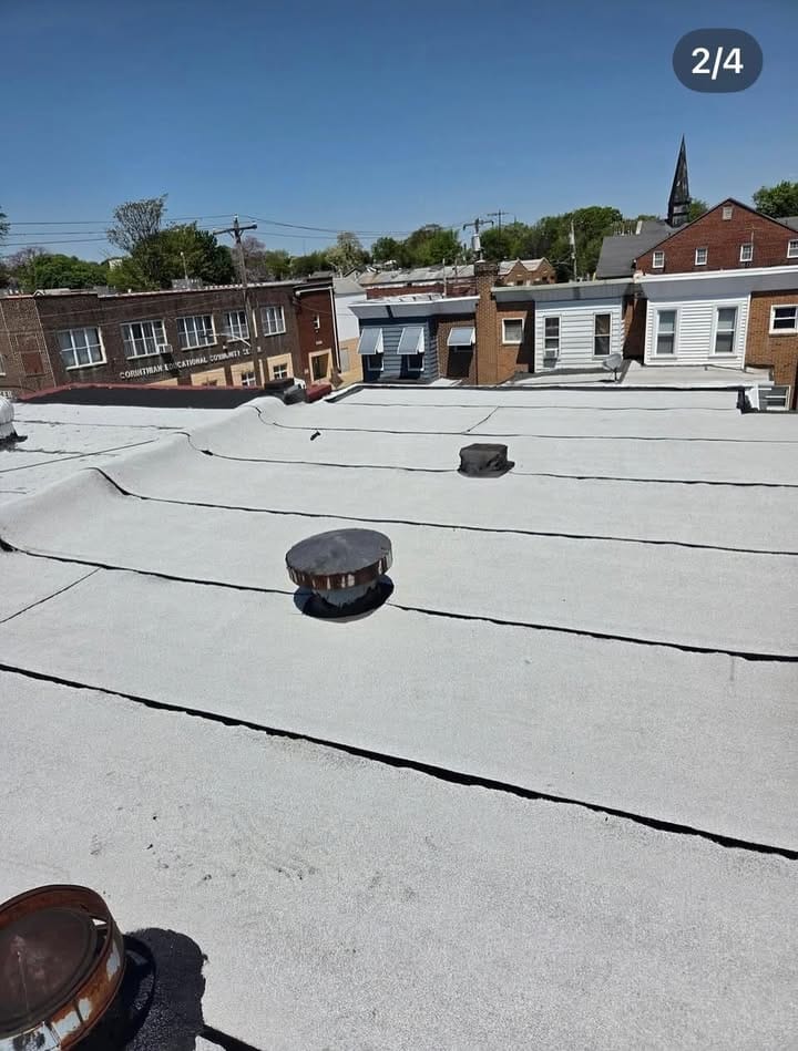 After — Worn membrane restored with a reflective roof coating